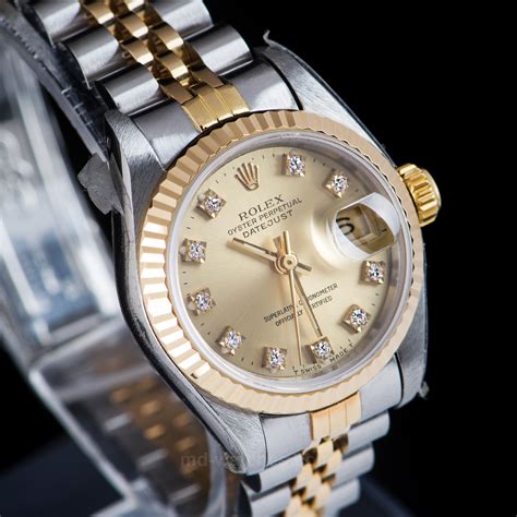 ladies rolex oyster perpetual datejust gold with diamonds